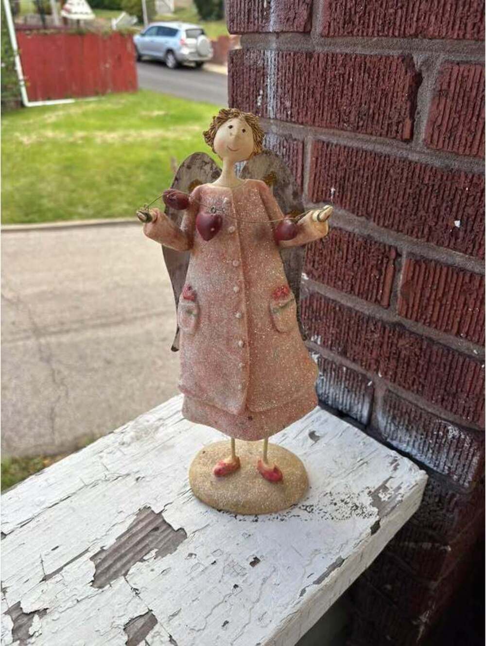 Decorative Angel Figurine with Heart Garland